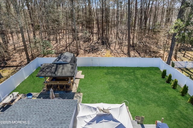 view of yard with a fenced backyard and a patio area