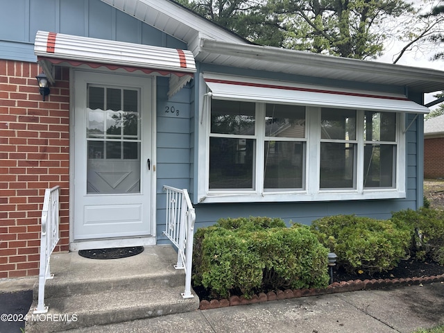 20 Lexington Dr Unit B, Whiting, NJ 08759 - property entrance featuring board and batten siding