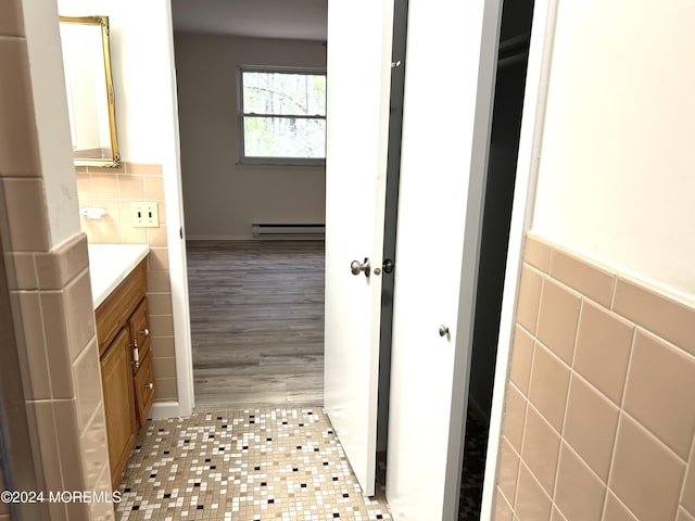20 Lexington Dr Unit B, Whiting, NJ 08759 - bathroom featuring a baseboard radiator, vanity, tile walls, and wood finished floors