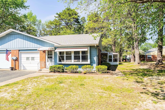 20 Lexington Dr Unit B, Whiting, NJ 08759 - single story home featuring a garage, brick siding, a front yard, asphalt driveway, and roof with shingles