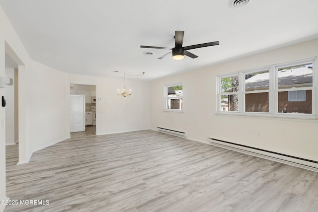 20 Lexington Dr Unit B, Whiting, NJ 08759 - empty room featuring baseboard heating, a chandelier, light wood-type flooring, ceiling fan, and a baseboard heating unit