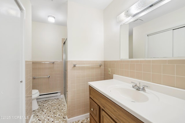 20 Lexington Dr Unit B, Whiting, NJ 08759 - bathroom with a baseboard heating unit, tile walls, toilet, a shower stall, and vanity