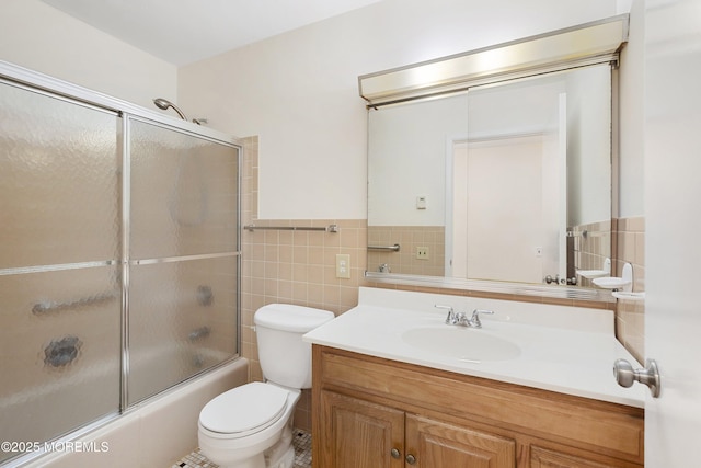 20 Lexington Dr Unit B, Whiting, NJ 08759 - full bathroom featuring vanity, tile walls, toilet, enclosed tub / shower combo, and a wainscoted wall