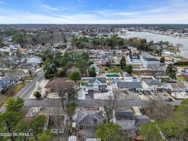 aerial view featuring a water view and a residential view