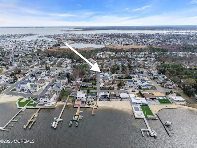 aerial view with a water view and a residential view
