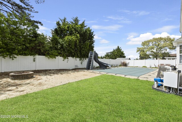 4 Frankies Ln, Toms River, NJ 08753 - view of yard with an outdoor fire pit and a patio