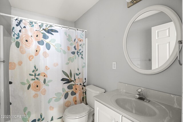 4 Frankies Ln, Toms River, NJ 08753 - full bathroom featuring vanity, toilet, and a shower with curtain