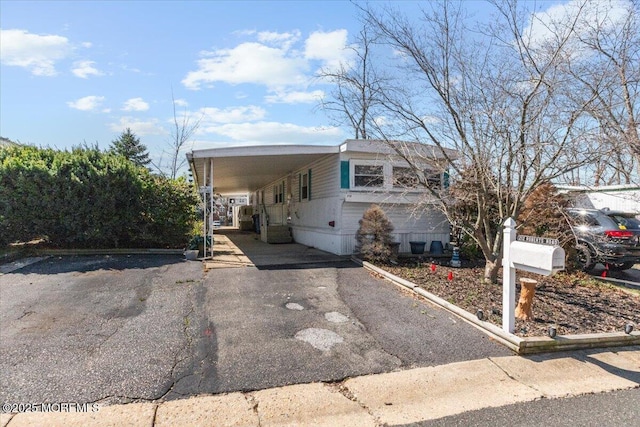 212 Roberts Rd, Toms River, NJ 08755 - manufactured / mobile home featuring a carport and aphalt driveway
