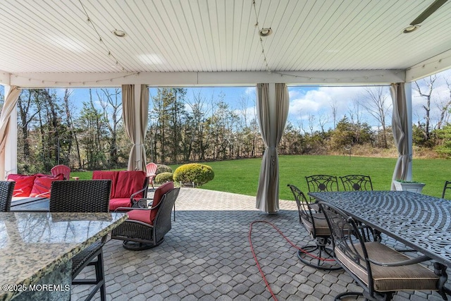 view of patio with outdoor dining area