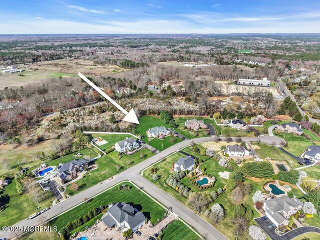 drone / aerial view with a residential view