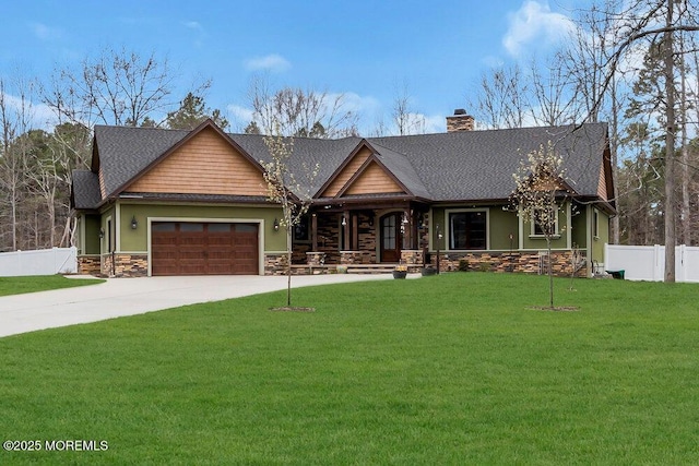 view of front of house with a garage, fence, a front lawn, driveway, and roof with shingles