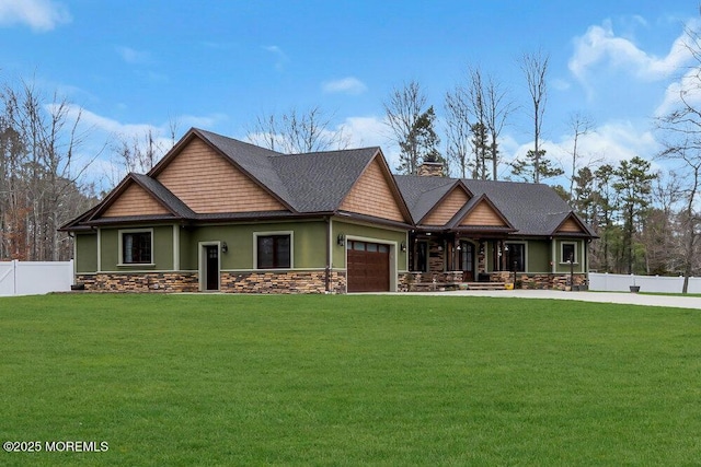craftsman inspired home with a front lawn, fence, a garage, and a chimney