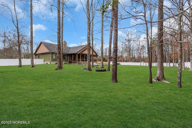 view of yard featuring fence