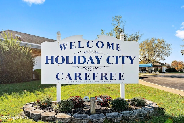 view of community sign