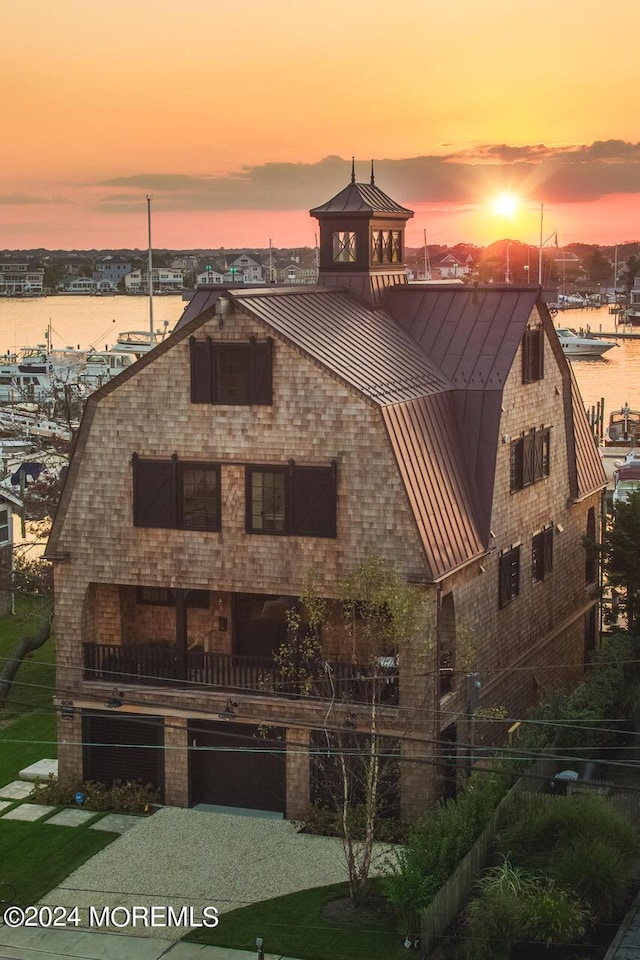 exterior space with a water view