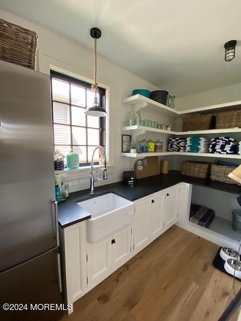 pantry featuring a sink