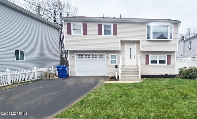 624 Hudson Ave, Port Monmouth, NJ 07758 - bi-level home with a garage and asphalt driveway