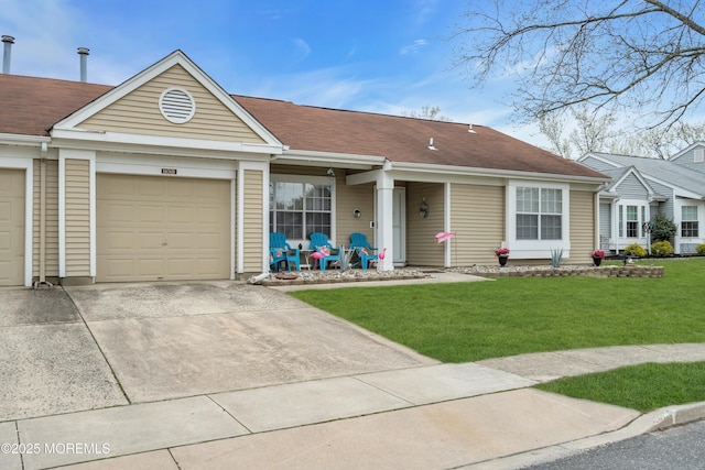 1101B Thornbury Ln, Manchester, NJ 08759 - view of front of property with a front yard, driveway, and an attached garage