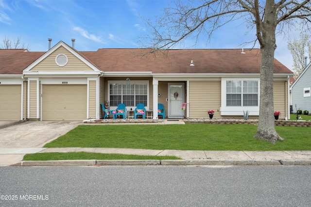 1101B Thornbury Ln, Manchester, NJ 08759 - view of front of property featuring a front lawn, a shingled roof, a garage, and concrete driveway