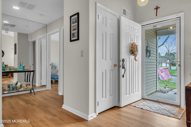 1101B Thornbury Ln, Manchester, NJ 08759 - entrance foyer featuring light wood-type flooring, baseboards, and visible vents