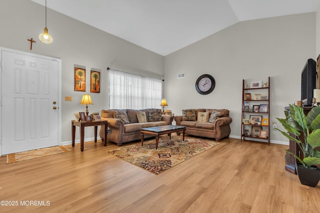 1101B Thornbury Ln, Manchester, NJ 08759 - living room with high vaulted ceiling, visible vents, light wood-type flooring, and baseboards