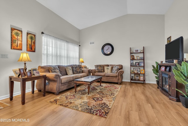 1101B Thornbury Ln, Manchester, NJ 08759 - living area with high vaulted ceiling, visible vents, light wood-type flooring, and baseboards