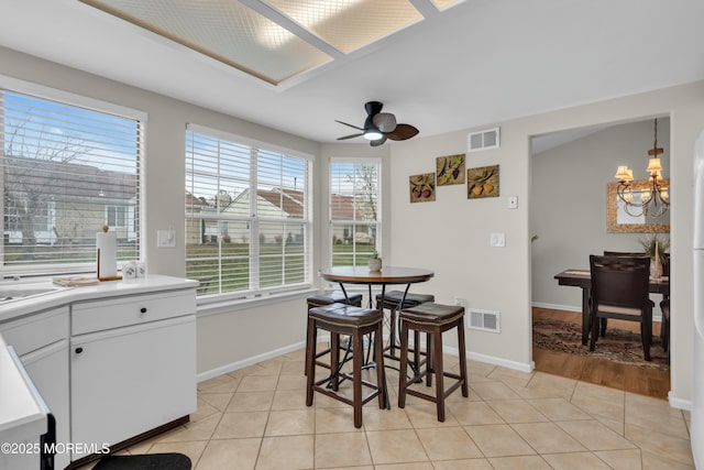 1101B Thornbury Ln, Manchester, NJ 08759 - dining area featuring light tile patterned floors, visible vents, and baseboards