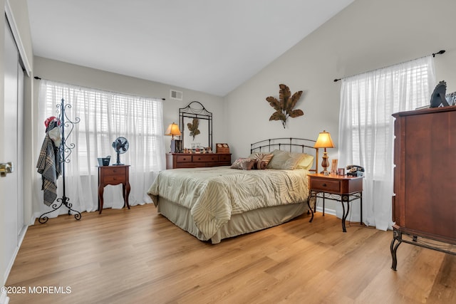 1101B Thornbury Ln, Manchester, NJ 08759 - bedroom featuring wood finished floors, lofted ceiling, multiple windows, and visible vents