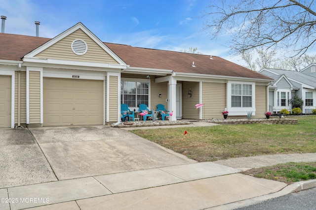 1101B Thornbury Ln, Manchester, NJ 08759 - view of front of property featuring a front yard, a garage, and driveway