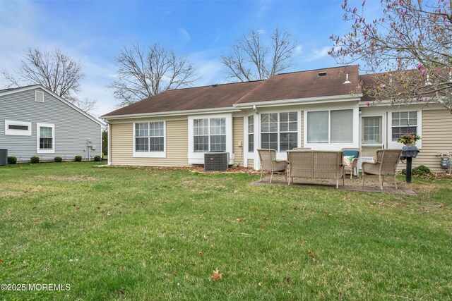 1101B Thornbury Ln, Manchester, NJ 08759 - rear view of property with outdoor lounge area, a patio, central AC, and a lawn