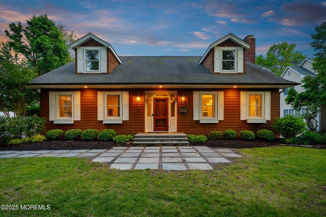 491 Clinton Ave, Toms River, NJ 08753 - view of front of home with a chimney, a front yard, and roof with shingles