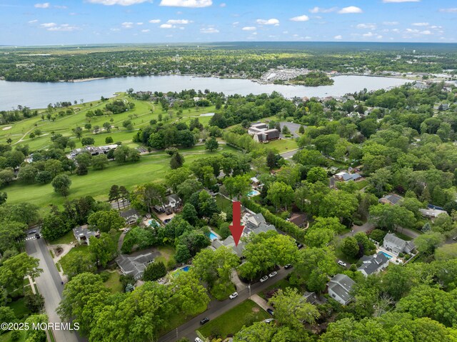 491 Clinton Ave, Toms River, NJ 08753 - aerial perspective of suburban area with a nearby body of water and a tree filled landscape