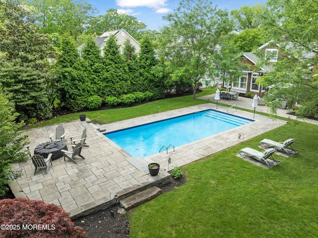 491 Clinton Ave, Toms River, NJ 08753 - outdoor pool with a patio, a lawn, and view of scattered trees
