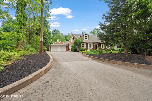 491 Clinton Ave, Toms River, NJ 08753 - view of front of home with decorative driveway and a garage