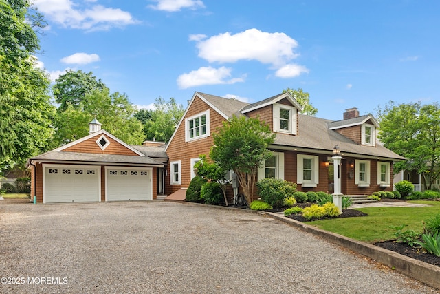 491 Clinton Ave, Toms River, NJ 08753 - shingle-style home featuring a chimney, a shingled roof, a front lawn, and asphalt driveway