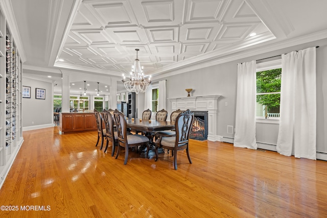 491 Clinton Ave, Toms River, NJ 08753 - dining room with a chandelier, a warm lit fireplace, healthy amount of natural light, recessed lighting, and ornamental molding