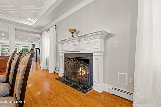 491 Clinton Ave, Toms River, NJ 08753 - living area with a baseboard radiator, light wood-style floors, a tile fireplace, decorative columns, and recessed lighting