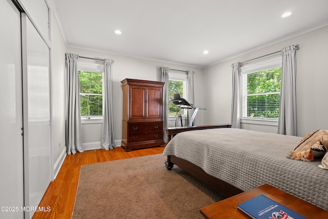 491 Clinton Ave, Toms River, NJ 08753 - bedroom with ornamental molding, light wood finished floors, recessed lighting, and baseboards