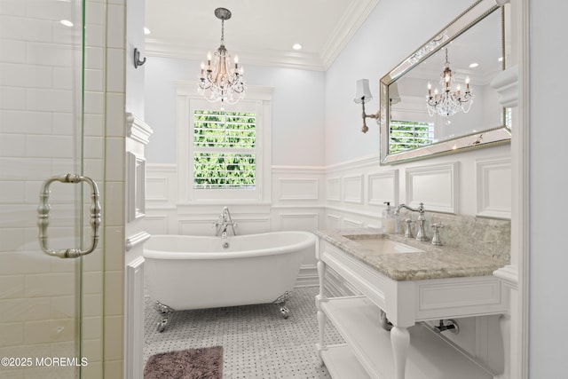 491 Clinton Ave, Toms River, NJ 08753 - full bathroom with a chandelier, a shower stall, wainscoting, a freestanding tub, and a decorative wall