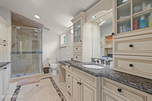 491 Clinton Ave, Toms River, NJ 08753 - bathroom with vanity, a shower stall, toilet, inlaid floor details, and recessed lighting