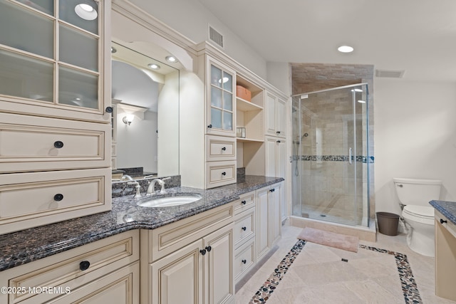 491 Clinton Ave, Toms River, NJ 08753 - bathroom with vanity, toilet, a shower stall, recessed lighting, and inlaid floor details