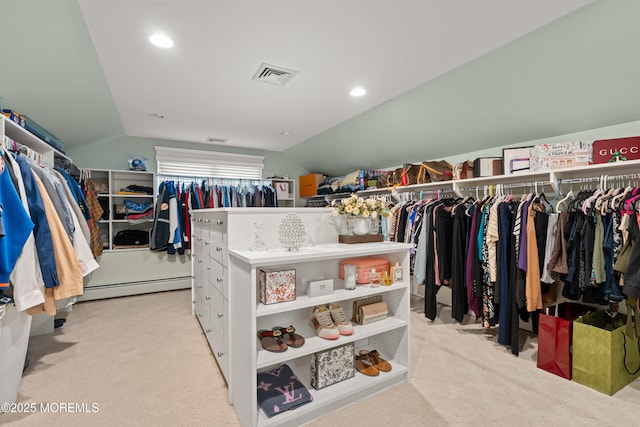 491 Clinton Ave, Toms River, NJ 08753 - spacious closet with vaulted ceiling, light carpet, and a baseboard heating unit