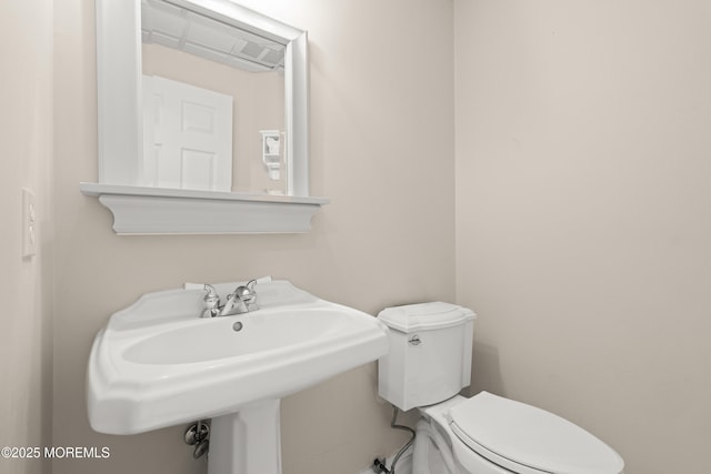 491 Clinton Ave, Toms River, NJ 08753 - half bath featuring toilet and a sink