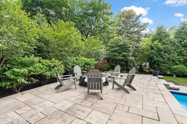 491 Clinton Ave, Toms River, NJ 08753 - view of patio with an outdoor fire pit and an outdoor pool