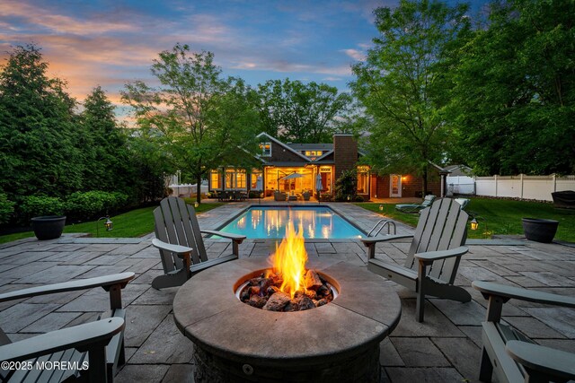 491 Clinton Ave, Toms River, NJ 08753 - view of swimming pool with an outdoor fire pit and a patio