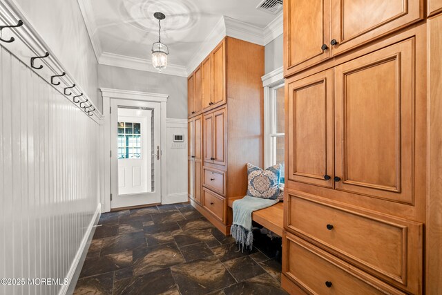 491 Clinton Ave, Toms River, NJ 08753 - mudroom featuring dark stone finish floors, crown molding, and baseboards