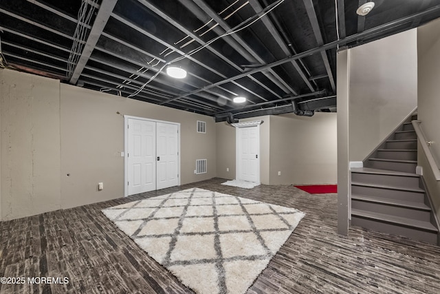 5 Breckenridge Ct, Freehold, NJ 07728 - finished basement with visible vents, wood finished floors, and stairs