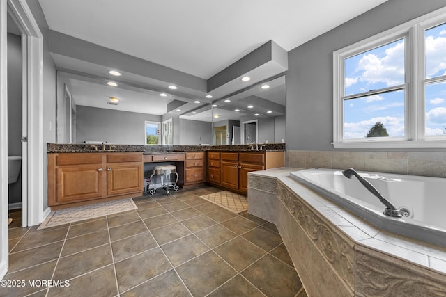 5 Breckenridge Ct, Freehold, NJ 07728 - bathroom with a sink, double vanity, a bath, and recessed lighting