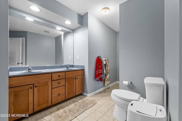 5 Breckenridge Ct, Freehold, NJ 07728 - bathroom featuring a sink, double vanity, toilet, and tile patterned floors