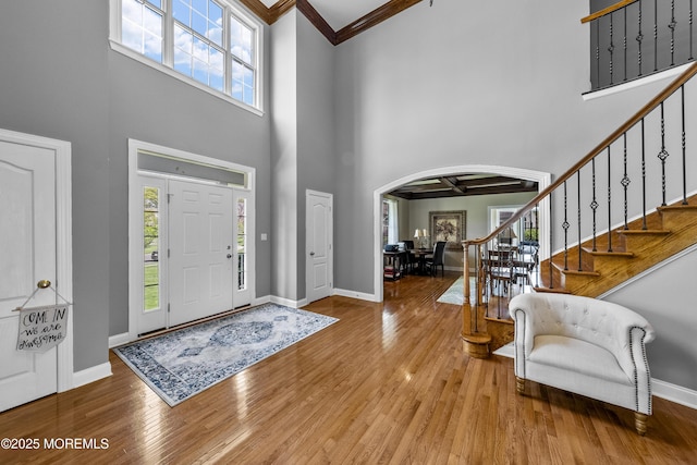 5 Breckenridge Ct, Freehold, NJ 07728 - foyer with plenty of natural light, stairway, a towering ceiling, and arched walkways